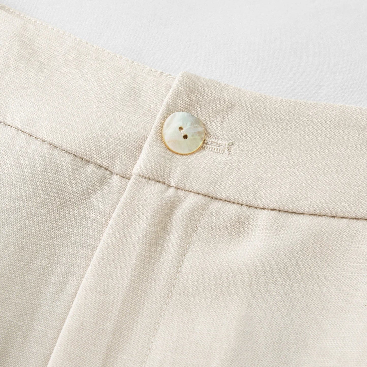 Wide-Leg Pleated Trousers