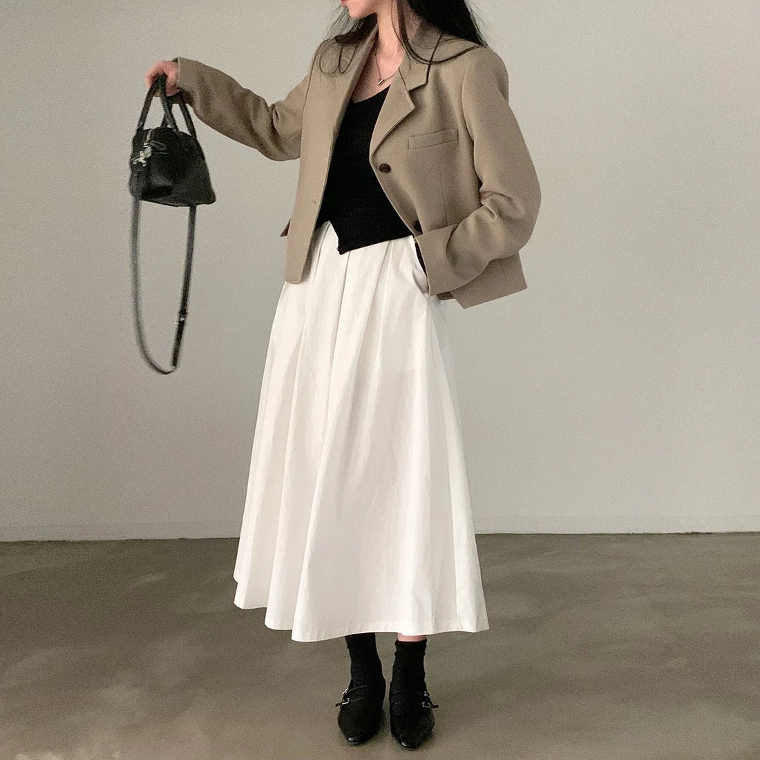 The Atelier Pleat Skirt